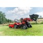 Traktor Case IH z ładowaczem czołowym i przyczepą